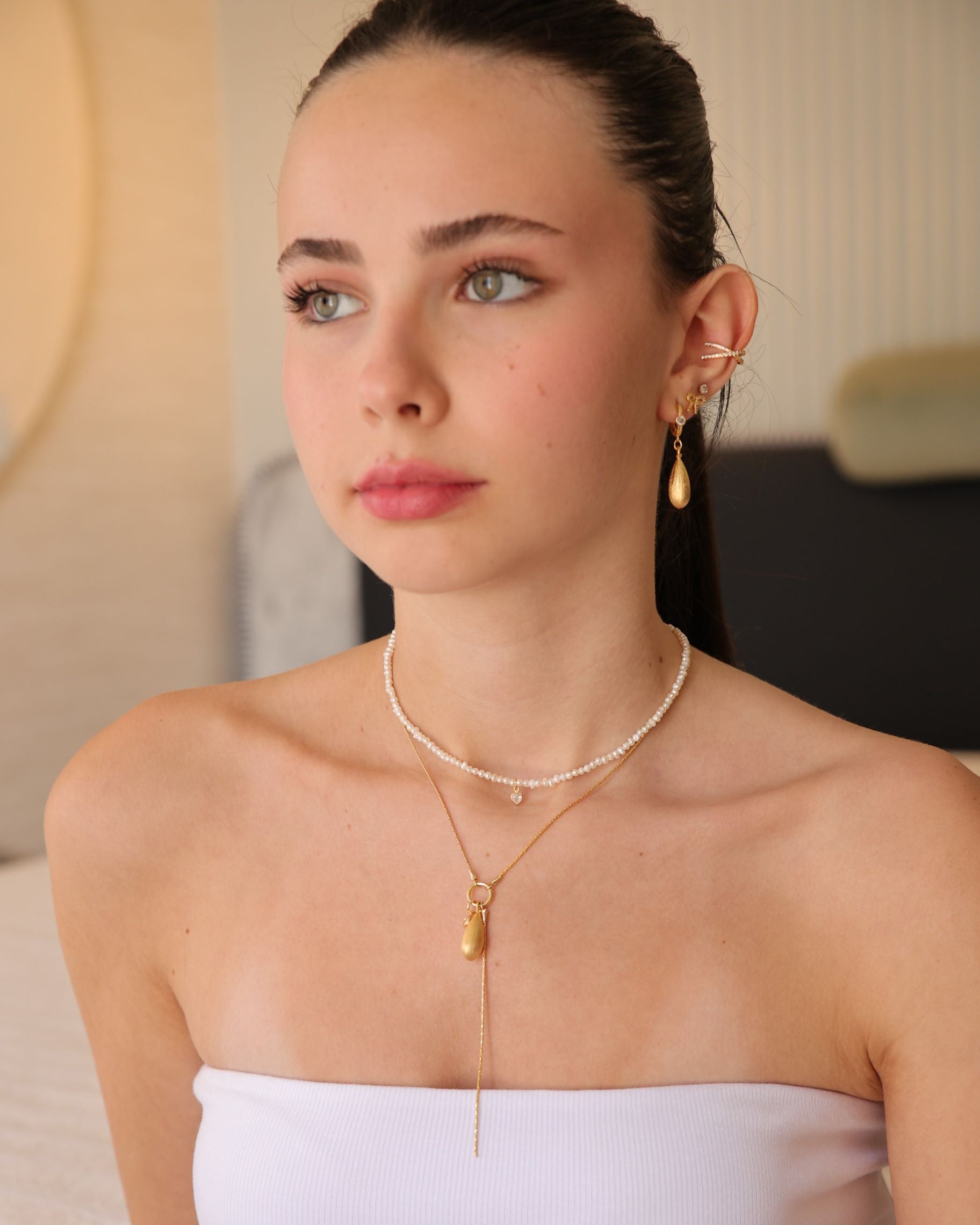 עגיל טיאה איקס משובץ