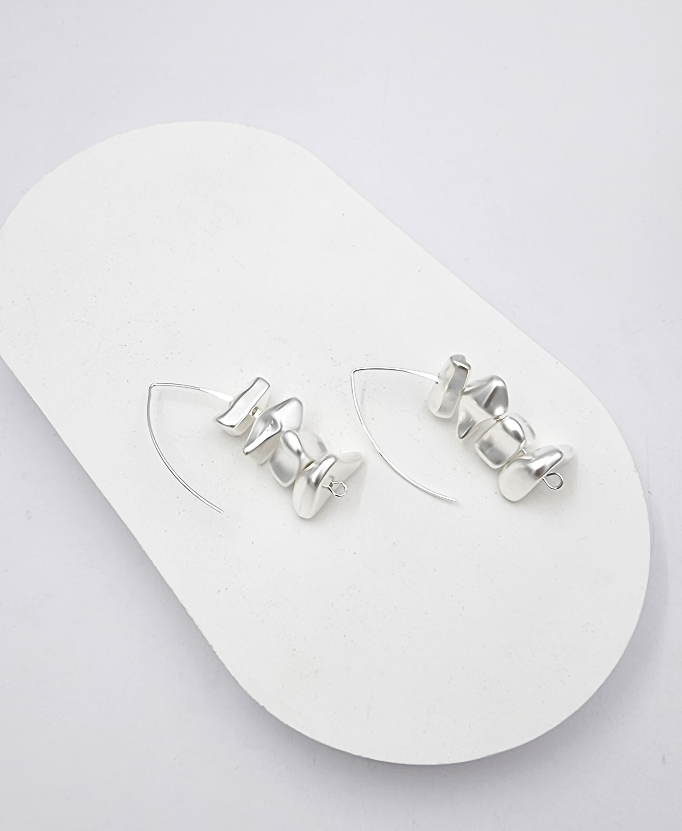 עגילי פלחים פראי מאונך כסוף