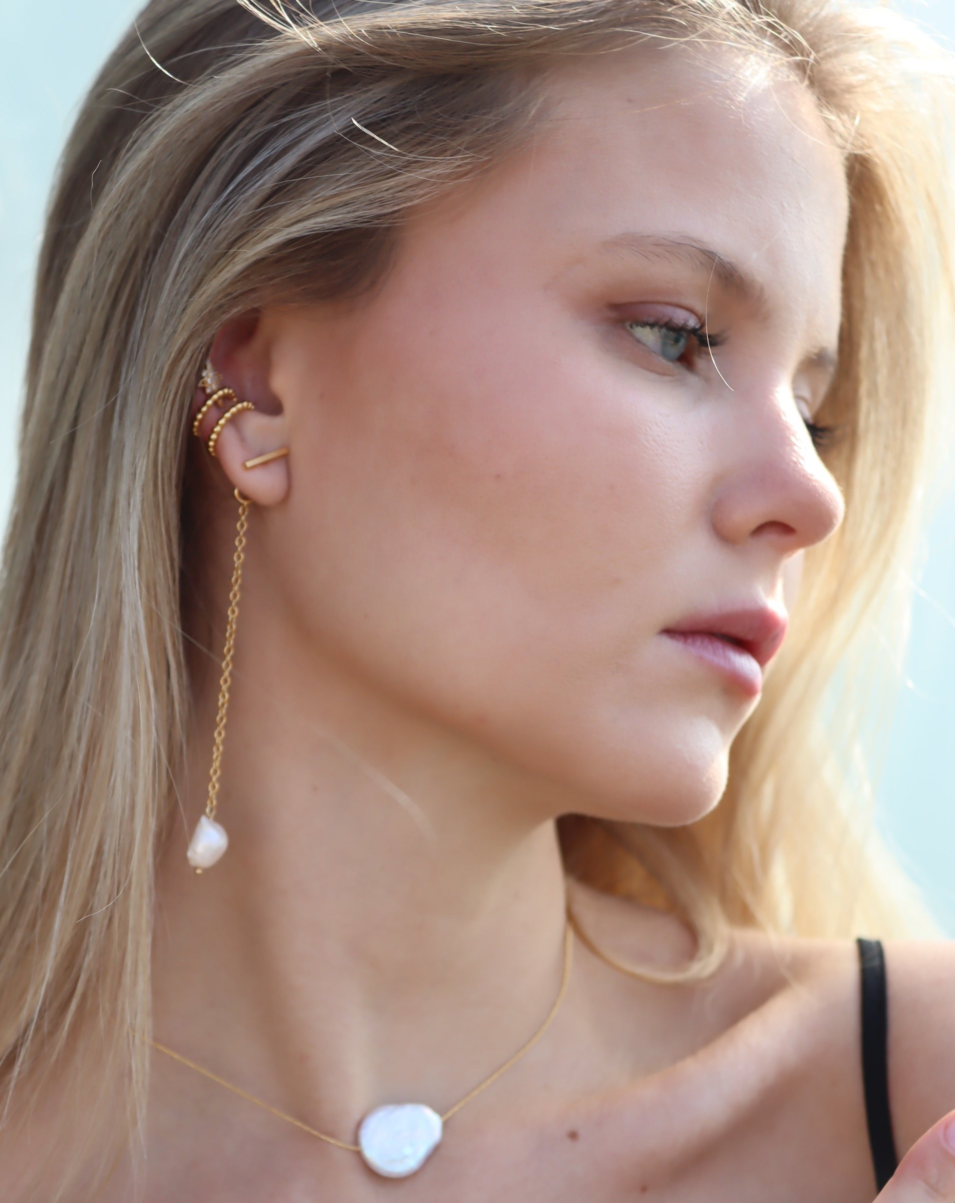 עגילי פנינה חובקים אלין