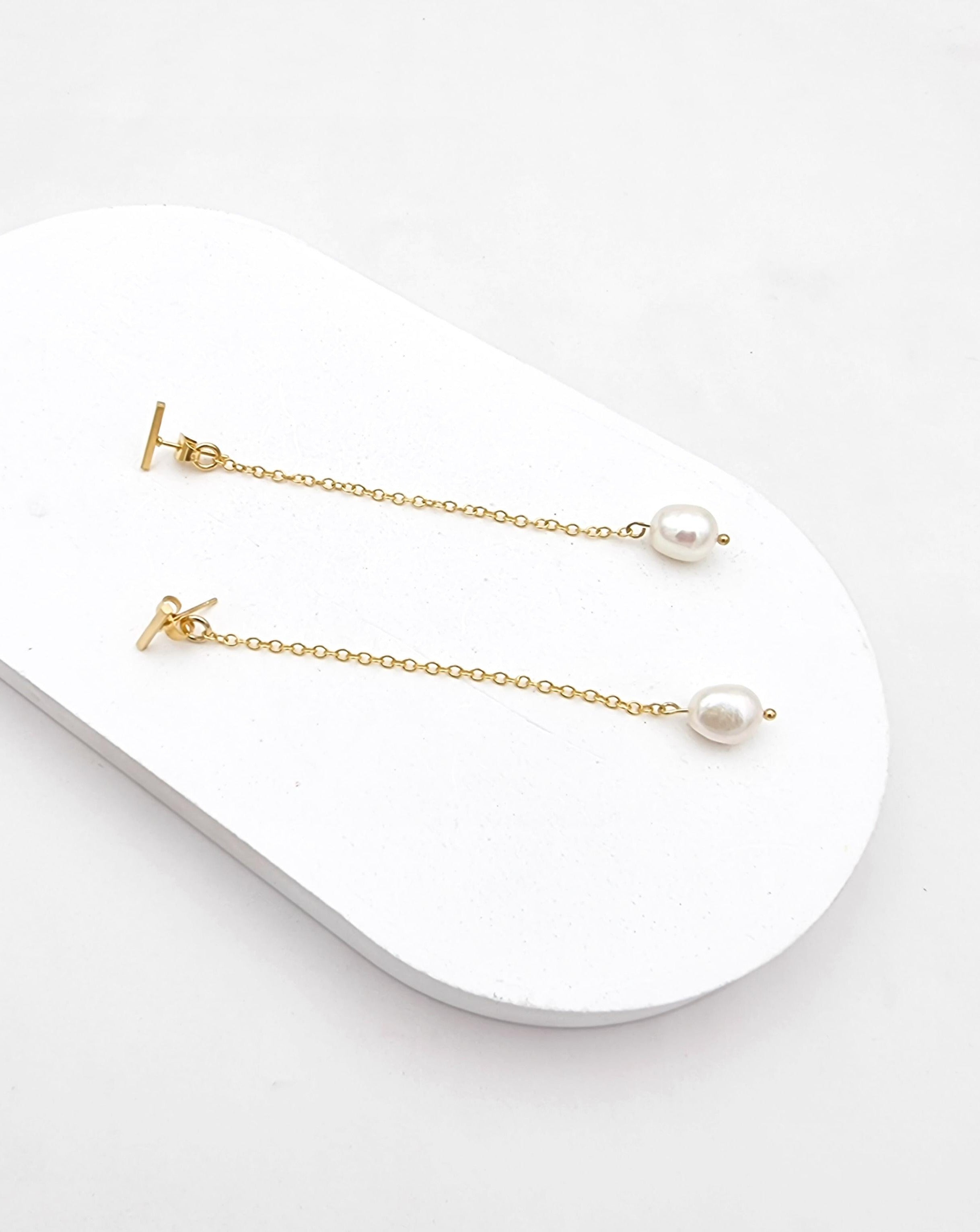 עגילי פנינה חובקים אלין