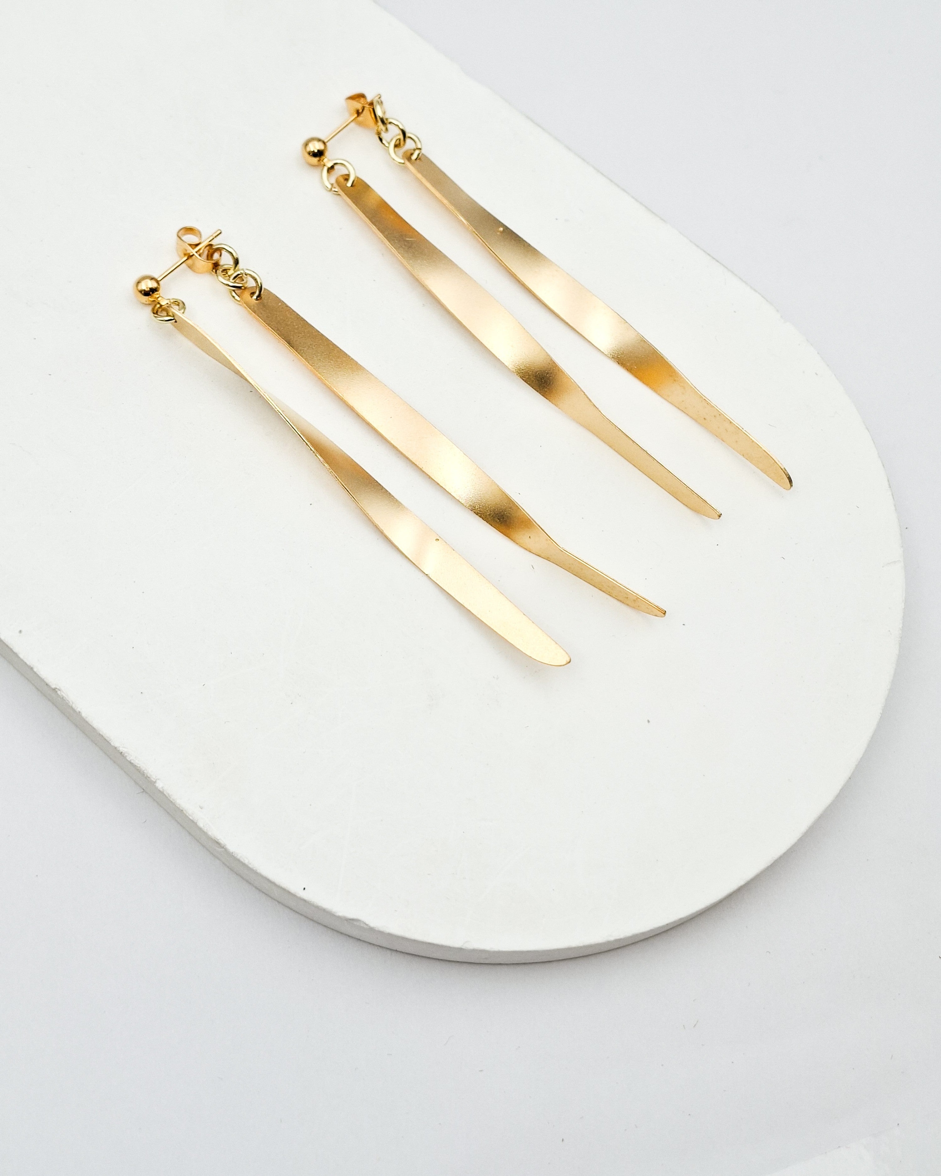 עגילים כפולים ארוכים מסובבים